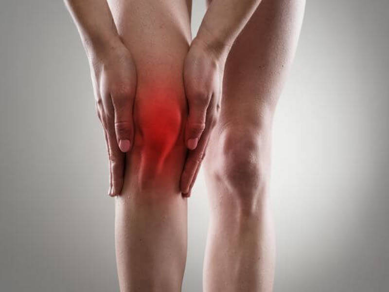 Pain behind the knee with highlighted red inflammation